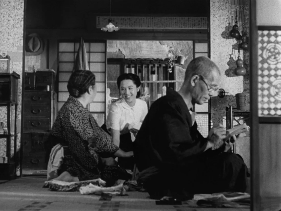 Elders training karate on tatami in a traditional Okinawan dojo