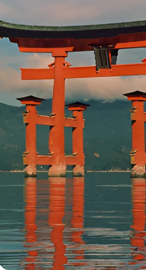 Red torii gate standing in the sea at Itsukushima
